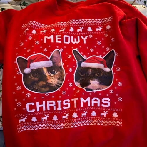 Meowy Christmas Sweatshirt with 2 cats on it